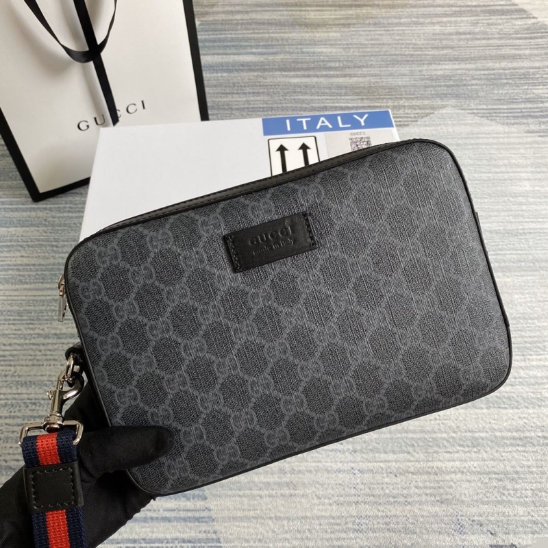 G*u*i clutch bags